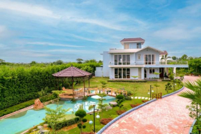StayVista at Serenity Farms with Pool, Lawn, Bonfire & BBQ